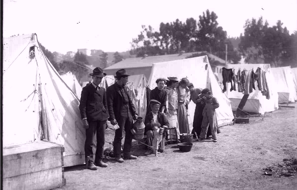 Refuges in one of the Army camps waiting for water.