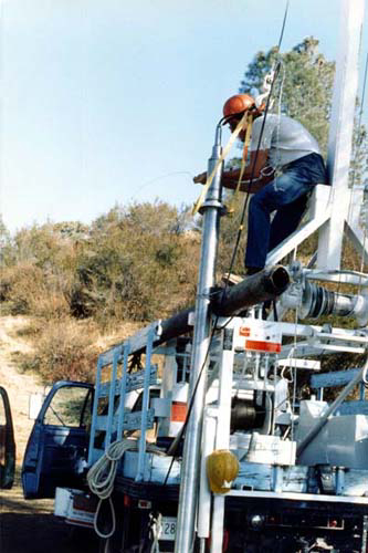 Installing a borehole strainmeter.